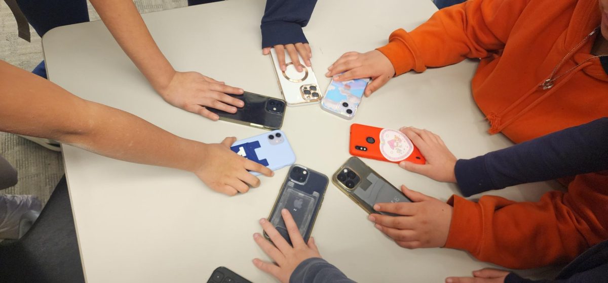 DO PHONES BELONG IN CLASS? 